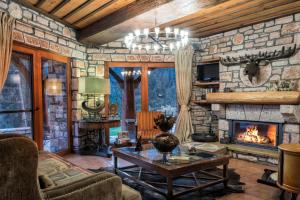 A television and/or entertainment centre at Mythica Chalet