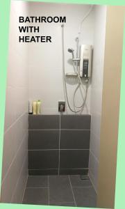 Bilik mandi di HomezStay Soho Timesquare Miri