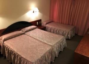 Letto o letti in una camera di Hotel Roc Del Castell