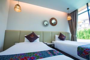 Ein Bett oder Betten in einem Zimmer der Unterkunft Good Night Pool Villa Phuket - SHA Plus