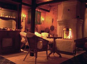 Posezení v ubytování Vargheden B&B och trädgård