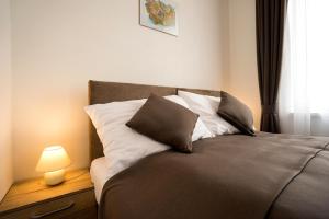 Posteľ alebo postele v izbe v ubytovaní BIVIO hotel