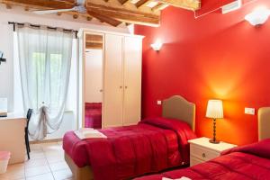 A bed or beds in a room at Porta Mazzini Affittacamere