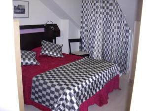 A bed or beds in a room at La Traina