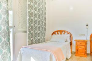 Posteľ alebo postele v izbe v ubytovaní Hotel Iberico