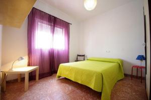 Postel nebo postele na pokoji v ubytování Casa Lepanto