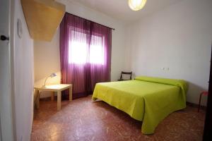 Postel nebo postele na pokoji v ubytování Casa Lepanto