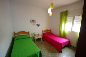 Postel nebo postele na pokoji v ubytování Casa Lepanto