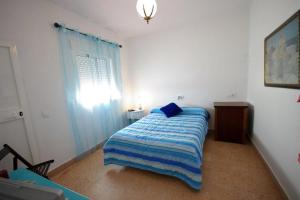 Postel nebo postele na pokoji v ubytování Casa Lepanto