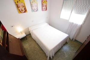 Postel nebo postele na pokoji v ubytování Casa Lepanto