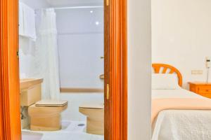 Posteľ alebo postele v izbe v ubytovaní Hotel Iberico