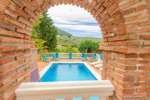 Bazén v ubytování Casa Jardín del Olivar con Piscina privada nebo v jeho okolí
