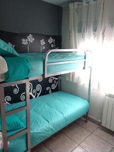 Postel nebo postele na pokoji v ubytování Piso La Torre