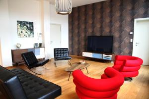 TV a/nebo společenská místnost v ubytování Hoogpoort Residence George