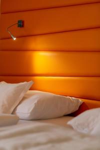 Postel nebo postele na pokoji v ubytování Hotel Continental