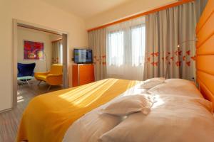 Postel nebo postele na pokoji v ubytování Hotel Continental