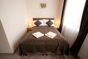 Posteľ alebo postele v izbe v ubytovaní BIVIO hotel