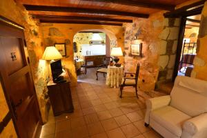 an overhead view of a living room with a table and chairs at Casa Rural El Borbullón in Teror