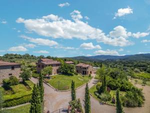 an aerial view of a villa with a garden at Poggio Cennina Resort in Bucine