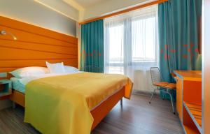 Postel nebo postele na pokoji v ubytování Hotel Continental