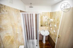 Koupelna v ubytování Hotel Paganini