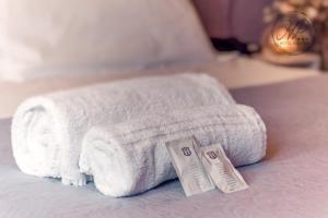 Postel nebo postele na pokoji v ubytování Hotel Paganini