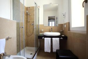 Koupelna v ubytování Trianon Borgo Pio Aparthotel