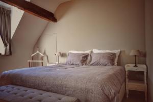 Letto o letti in una camera di B&B Stillant