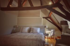 Letto o letti in una camera di B&B Stillant