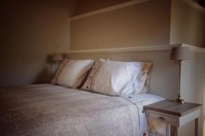 Letto o letti in una camera di B&B Stillant