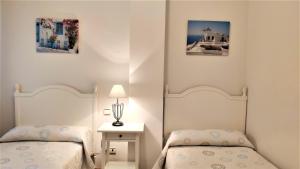 Postel nebo postele na pokoji v ubytování El Campanario del Paraíso + 37 fotografií