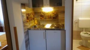 Koupelna v ubytování Apartmani Vitković II Cres