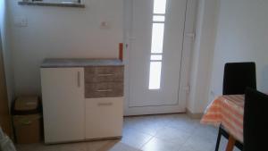 Kuchyň nebo kuchyňský kout v ubytování Apartmani Vitković II Cres