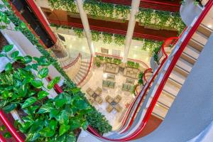 an overhead view of a building with a garden at Senator Huelva in Huelva