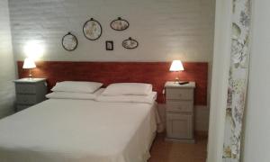 Tempat tidur dalam kamar di La Soleada