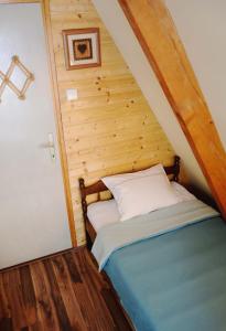 Cama o camas de una habitación en Cabin & Apartment Kopaonik