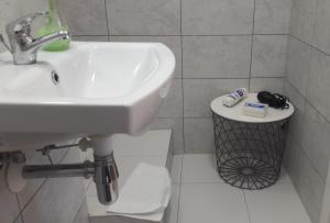 Kúpeľňa v ubytovaní Ogrodowa Apartments