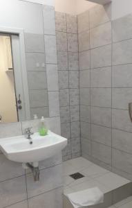 Kúpeľňa v ubytovaní Ogrodowa Apartments