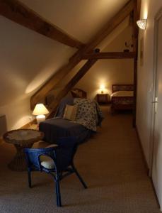 เตียงในห้องที่ Le Clos de Châtres