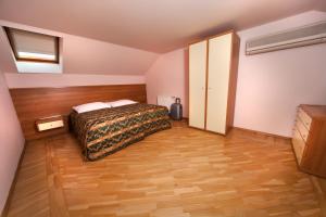 Postel nebo postele na pokoji v ubytování Hotel Residence Select