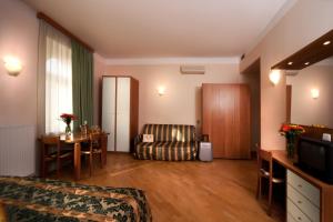 Postel nebo postele na pokoji v ubytování Hotel Residence Select