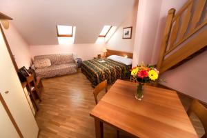 Postel nebo postele na pokoji v ubytování Hotel Residence Select