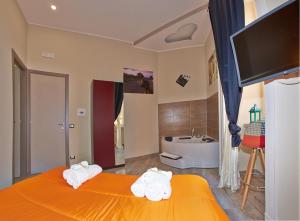 A bed or beds in a room at Artisti Bed&Dreams