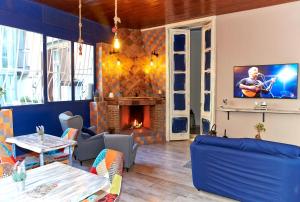A television and/or entertainment centre at Artisti Bed&Dreams