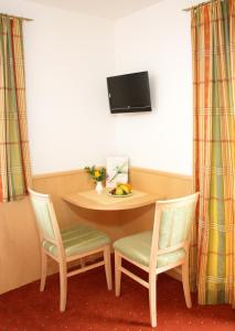 TV a/nebo společenská místnost v ubytování Hotel-Restaurant Stefanihof