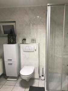Koupelna v ubytování Stilvolles Appartement + 12 fotografií