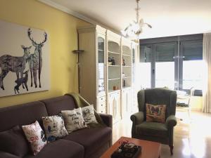 Ein Sitzbereich in der Unterkunft Junto PLAYA, Gemelos 23 con 2 baños Excelente opcion