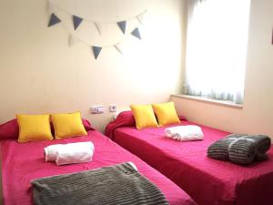 Ein Bett oder Betten in einem Zimmer der Unterkunft Junto PLAYA, Gemelos 23 con 2 baños Excelente opcion