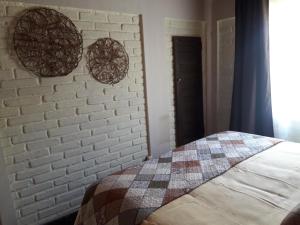 Postel nebo postele na pokoji v ubytování Hostal Arce Marrón + 16 fotografií