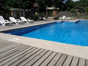 Bazén v ubytování Hostal Arce Marrón nebo v jeho okolí